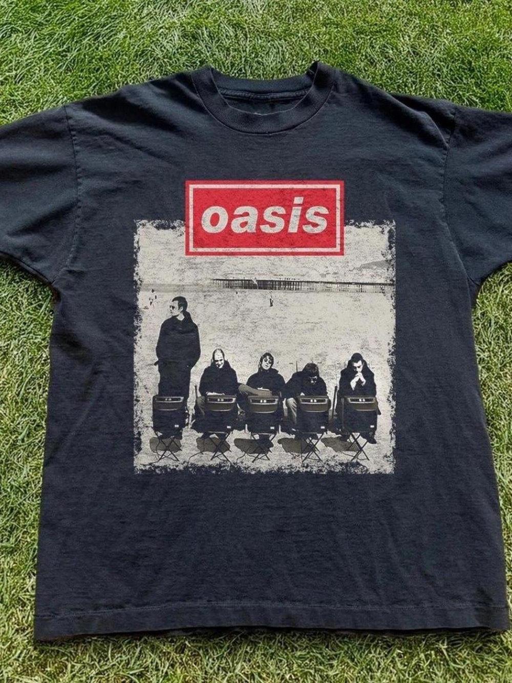 Oasis Black Tee with Red Logo and Monochrome